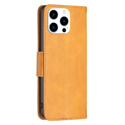 For iPhone 16 Pro Lambskin Texture Pure Color Flip Leather Phone Case(Yellow) - iPhone 16 Pro Cases by buy2fix | Online Shopping UK | buy2fix