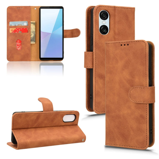 For Sony Xperia 10 VI 2024 Skin Feel Magnetic Flip Leather Phone Case(Brown) - Sony Cases by buy2fix | Online Shopping UK | buy2fix